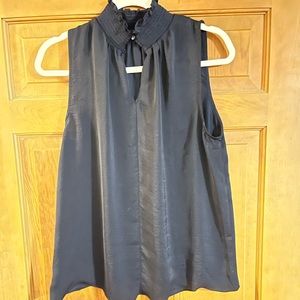 High neck sleeveless blouse